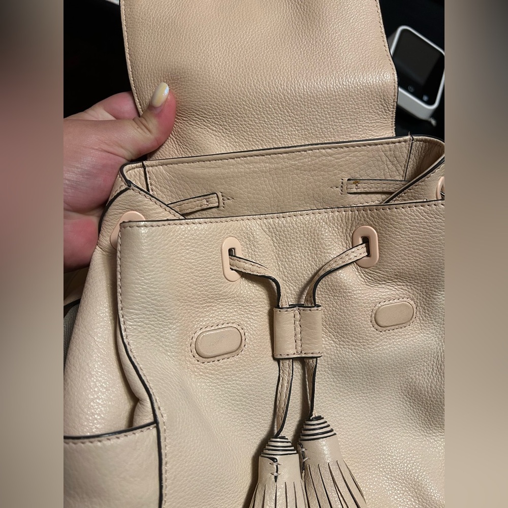 Tory Burch Cream Pebbled Leather Backpack with Tassels - Picture 4 of 4